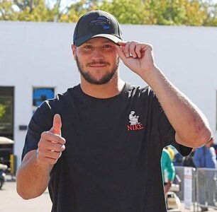 Josh black t shirt and cap 123122.jpg