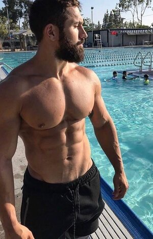 shirtless-muscular-pool-guy-big-pecs-beard.jpg