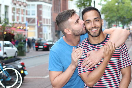 attractive-homosexual-lovers-kissing-outdoors-picture-id1166265284-4088754997.jpeg