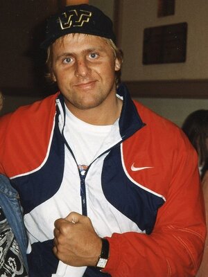 Owen_Hart_with_a_fan.jpg
