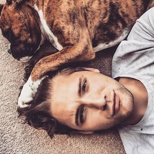 34-guy-lying-down-with-bulldog.jpg