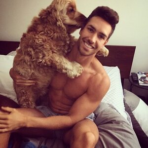 35-shirtless-man-carrying-poodle.jpg