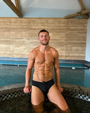 sitting on pool 302541952.jpg