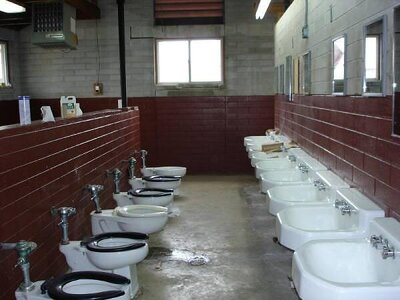 open shitters and stinks adjactent to open showers.jpg