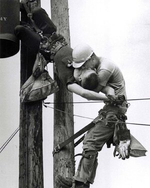 The Kiss of Life - A utility worker giving mouth-to-mouth to co-worker after he contacted a hi...jpg The Kiss of Life - A utility worker giving mouth-to-mouth to co-worker after he contacted a hi...jpg