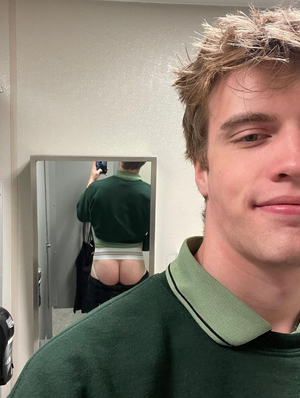 sexy blond dude showing off his butt.png