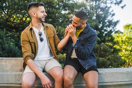 portrait-happy-gay-couple-spending-time-together-having-date-park-lgbt-love-concept_58466-11927.jpg