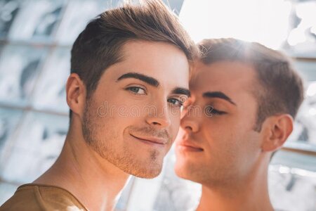 couldn-t-be-any-happier-portrait-affectionate-young-gay-couple-standing-close-together-home-79...jpg