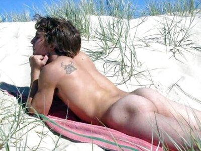 Hot guy sunbathing naked and his ass.jpeg