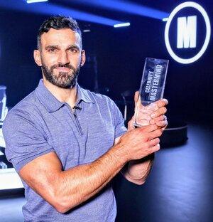 Davood Ghadami Celebrity Mastermind Winner with trophy .jpg