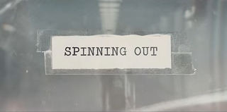 Spinning_Out_Title_Card.png