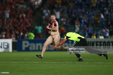 streaker-is-tackled-by-security.jpg