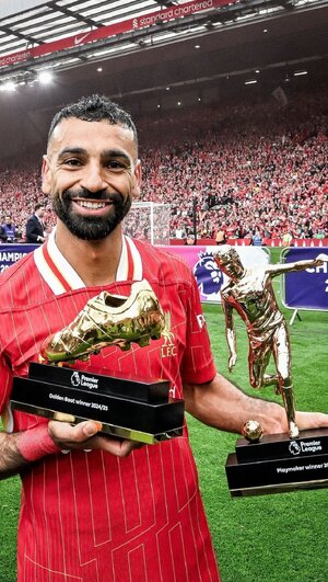 Mo Salah with the Golden Boot and playmaker of the year awards.jpg