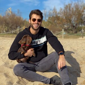 Joan Pastor and Pluto 133773239.jpg