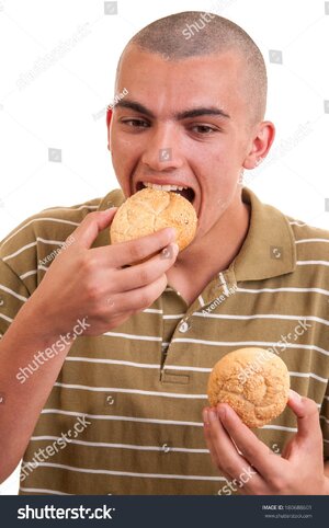 stock-photo-young-man-eating-buns-with-sesame-180688601.jpg