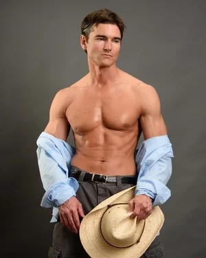 depositphotos_108457502-stock-photo-the-hot-cowboy.webp