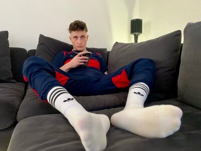 Nike sportswear and Adidas socks.jpeg