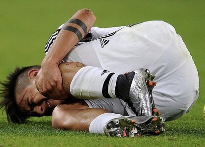 Paulo Dybala Rolling in white pants with brieflines.jpeg