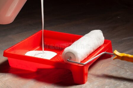 pouring-paint-painting-tray-white-latex-room-185464074.jpg