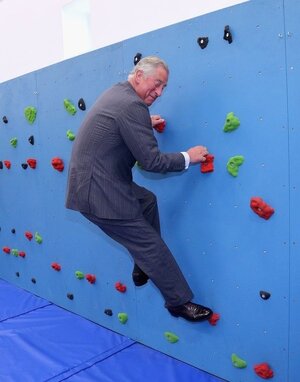 He will climb a rock wall in a suit_ _ 19 Reasons Why Prince Charles Is The Quirkiest Member ...jpeg
