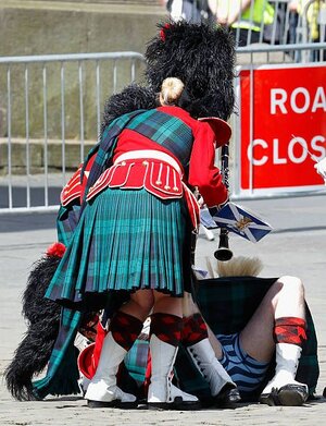 A member of the Band of the Royal Regiment of Scotland collapses_.jpeg