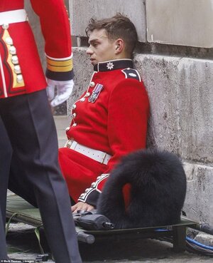 Five soldiers faint standing guard outside St Paul's Cathedral.jpeg
