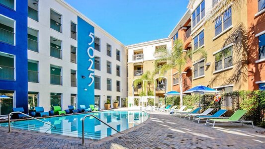 Swimming-pool-outside-colorful-apartment-buildings.jpg