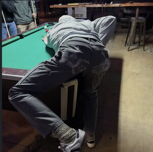 Playing pool while your friends are feeling frisky.jpeg