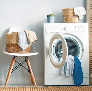 laundry-room-with-a-washing-machine-royalty-free-image-1567949316.jpg