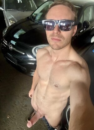 In the parking of a car dealer.jpeg