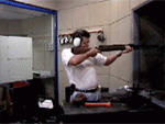 Funny-Guy-Shoots-Gun-Falls-Animation.gif