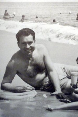 nixon shirtless at the beach.jpg