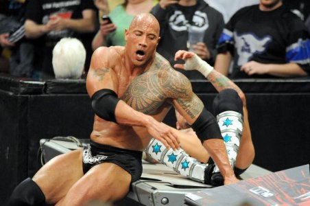 dwayne-johnson-shirtless-wwe-wrestling-01282013-07.jpg