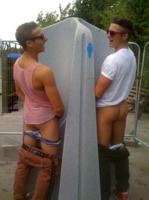 2 guys using a street urinal.jpg