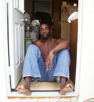 sexy_ebony_stud_traymont_bares_black_male_feet.jpg