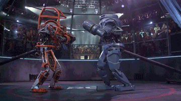 robot_combat_league_7_foot_robots_fighting_a_nice_hit_from_the_first_episode-35751.gif