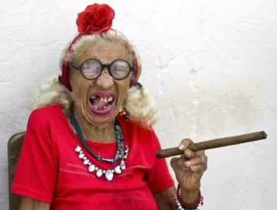130132654-cuba-old-woman-smoking-cigar-gettyimages.jpg