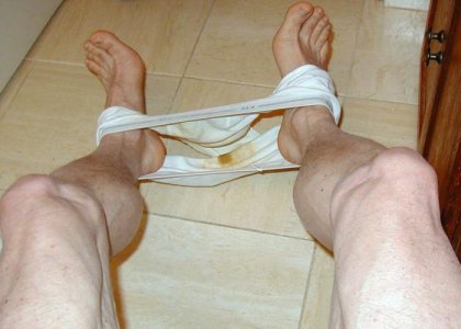 rankpitsfo shitstains on toilet with legs spread.jpg