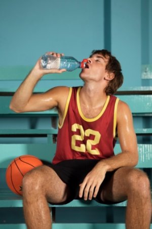 Sweaty_basketball_player_drinking_water.jpg