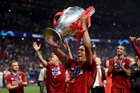 Trent Alexander-Arnold shows the cup to the fans (1).jpg