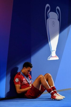 Trent Alexander-Arnold takes a break.jpg