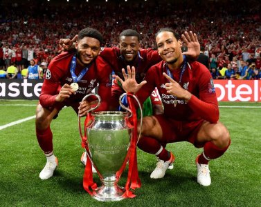 Joe Gomez, Gini Wijnaldum and Virgil van Dijk.jpg