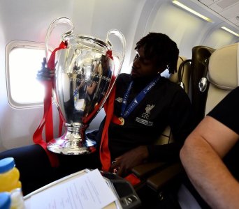 on the plane-Divock Origi (1).jpg
