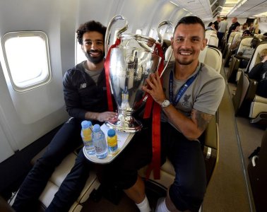 on the plane-Mo Salah and Dejan Lovren.jpg