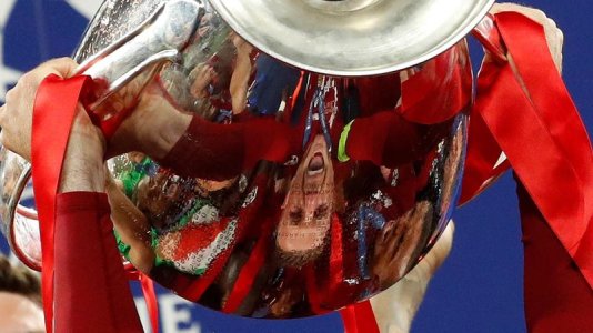 7 Jordan Henderson lifting the cup.jpg
