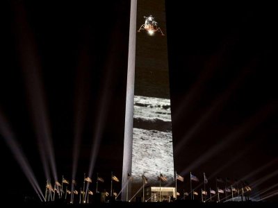 Washington, lunar module projected on Washington Monument to commemorate 50th anniversary of fir.jpg