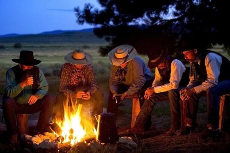 group-of-cowboys-around-a-campfire-richard-wear.jpg