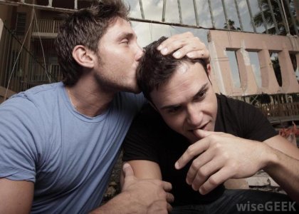 one-man-kissing-head-of-another.jpg