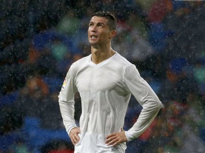 1171-cristiano-ronaldo-in-a-real-madrid-recycled-white-shirt.jpg