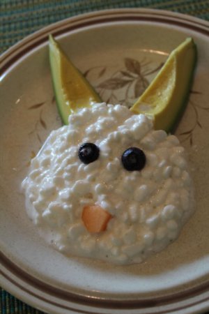 bunny made of cottage cheese and avocado with blueberries and cantaloupe.jpg